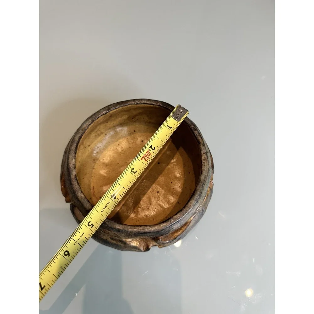 antique stone vase‎ with ornament in the form of fish